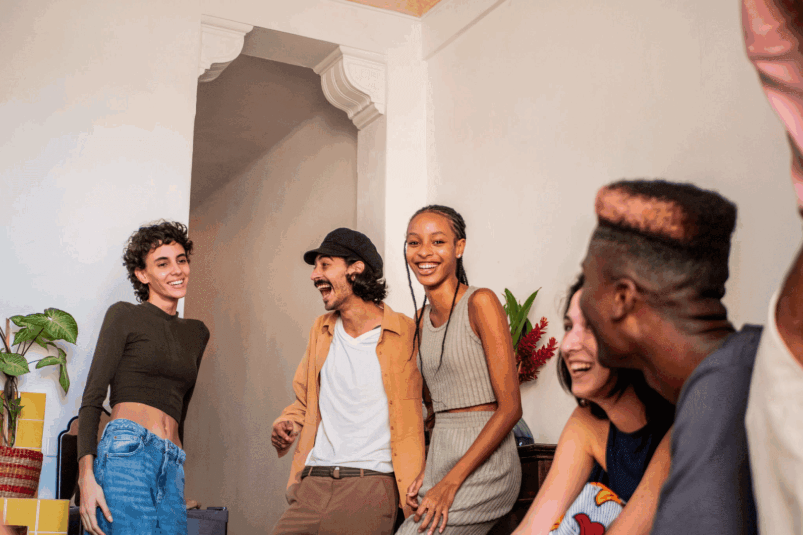 Group of friends laughing and enjoying together.